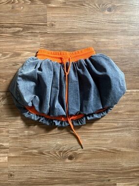 AKIRA Denim-Effect Mini Bubble Skirt with Orange Trim